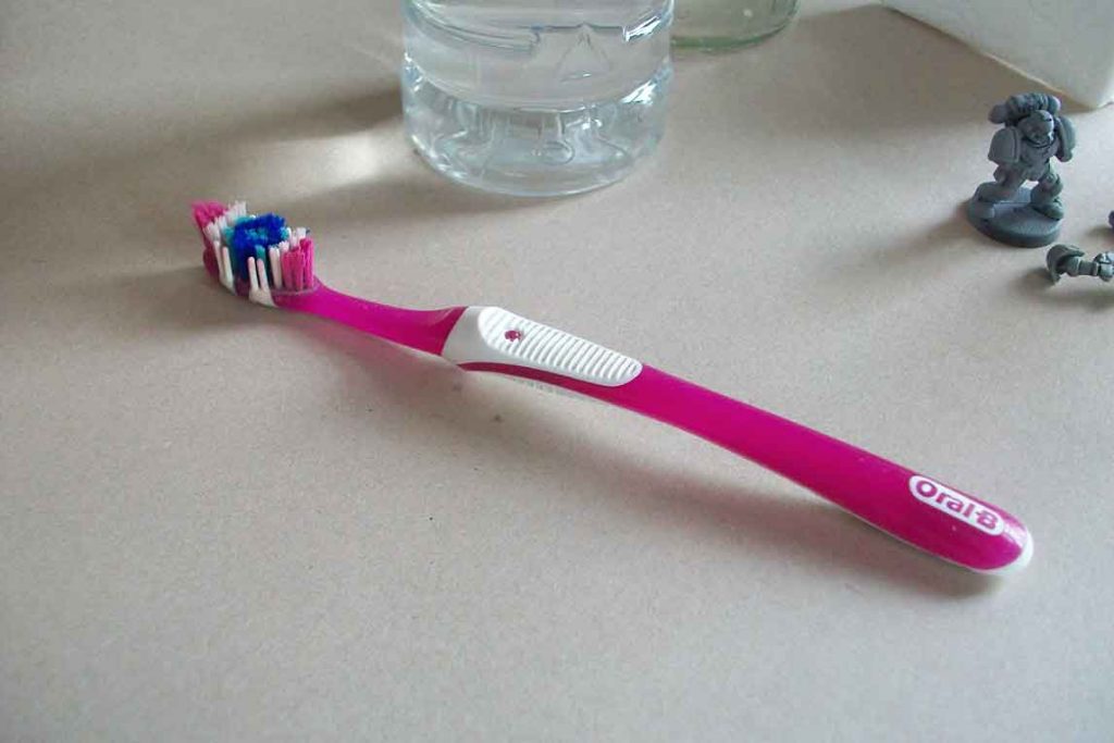 Tooth brush for models strip paint off of plastic miniatures